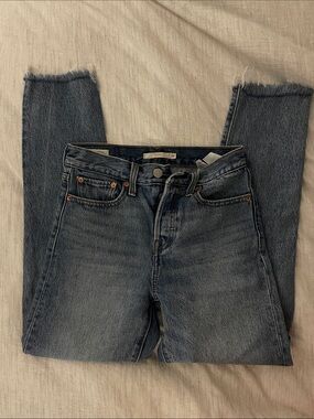 Levi's light medium blue wash Wedgie mid-rise jeans